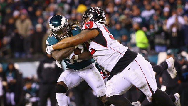 PHILADELPHIA, PA - JANUARY 13: Defensive back Randall Goforth #36 of the Philadelphia Eagles runs the ball and is tackled by defensive tackle Dontari Poe #92 of the Atlanta Falcons during the third quarter in the NFC Divisional Playoff game at Lincoln Financial Field on January 13, 2018 in Philadelphia, Pennsylvania.