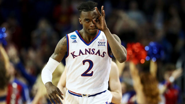WICHITA, KS - MARCH 15: Lagerald Vick #2 of the Kansas Jayhawks reacts after making a three point shot in the second half against the Pennsylvania Quakers during the first round of the 2018 NCAA Tournament at INTRUST Arena on March 15, 2018 in Wichita, Kansas.
