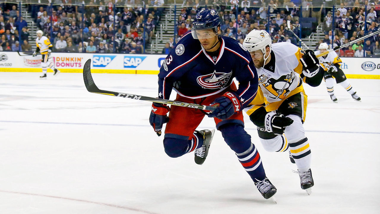 COLUMBUS, OH - APRIL 18: Seth Jones #3 of the Columbus Blue Jackets and Bryan Rust #17 of the Pittsburgh Penguins chase after the puck in Game Four of the Eastern Conference First Round during the 2017 NHL Stanley Cup Playoffs on April 18, 2017 at Nationwide Arena in Columbus, Ohio.