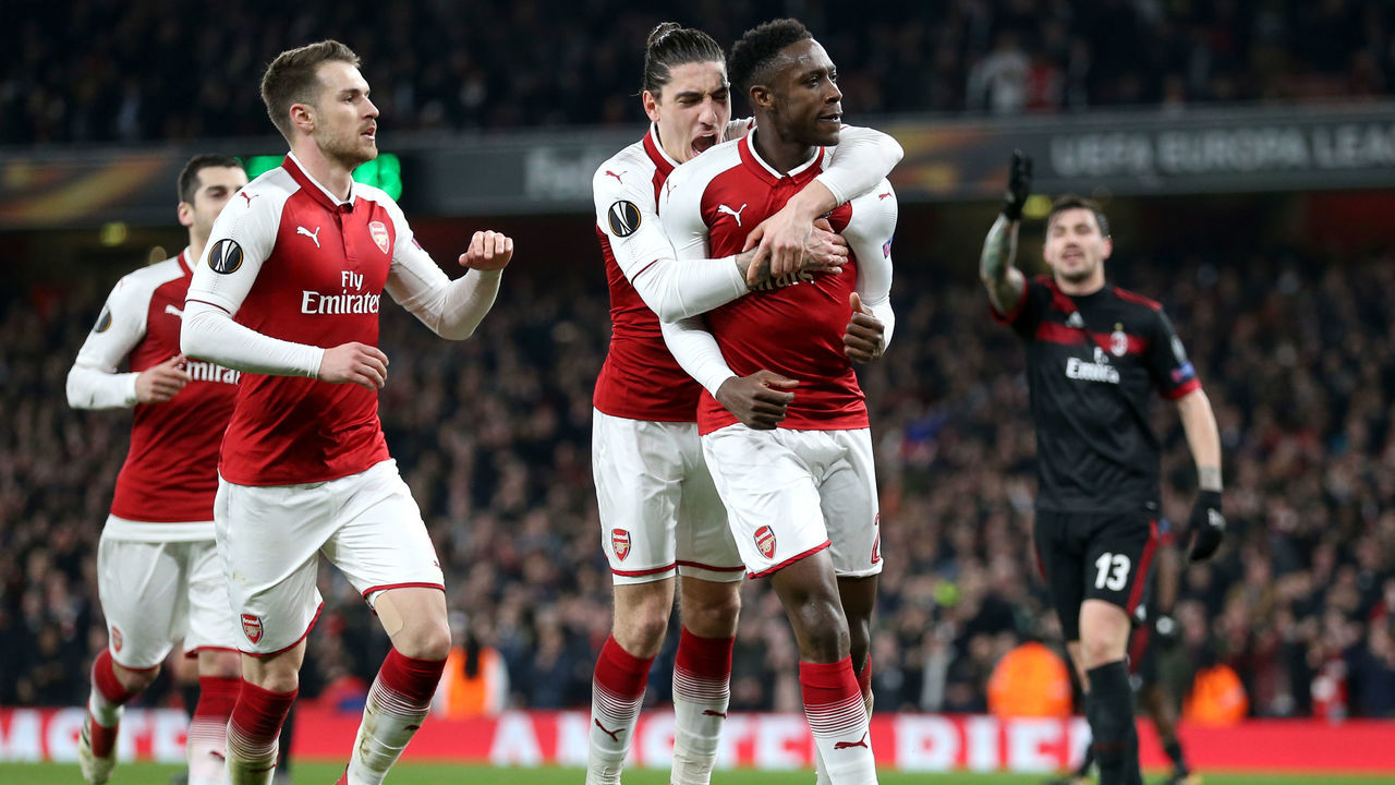 Arsenal's Danny Welbeck (right) celebrates scoring his side's first goal of the game during the UEFA Europa League round of 16, second leg match at the Emirates Stadium, London.