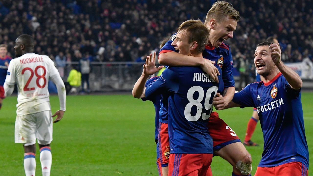 Moscow's players celebrates after scoring a goal during the UEFA Europa League round of 16 football match between Lyon (OL) and Moscow (CSKA Moscow) at the Groupama stadium in Decines-Charpieu near Lyon, central-eastern France, on March 15, 2018. / AFP PHOTO / JEAN-PHILIPPE KSIAZEK