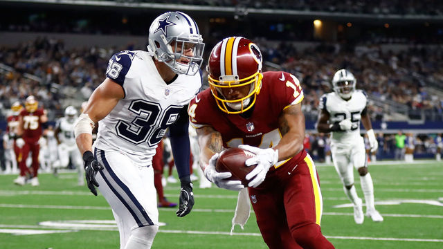 ARLINGTON, TX - NOVEMBER 30: Ryan Grant #14 of the Washington Redskins scores a touchown against Jeff Heath #38 of the Dallas Cowboys in the second quarter of a football game at AT&T Stadium on November 30, 2017 in Arlington, Texas.