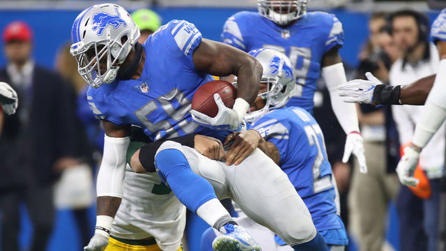 DETROIT, MI - DECEMBER 31: Tahir Whitehead #59 of the Detroit Lions recovers a fumbler by quarterback Brett Hundley #7 of the Green Bay Packers during the first half at Ford Field on December 31, 2017 in Detroit, Michigan.