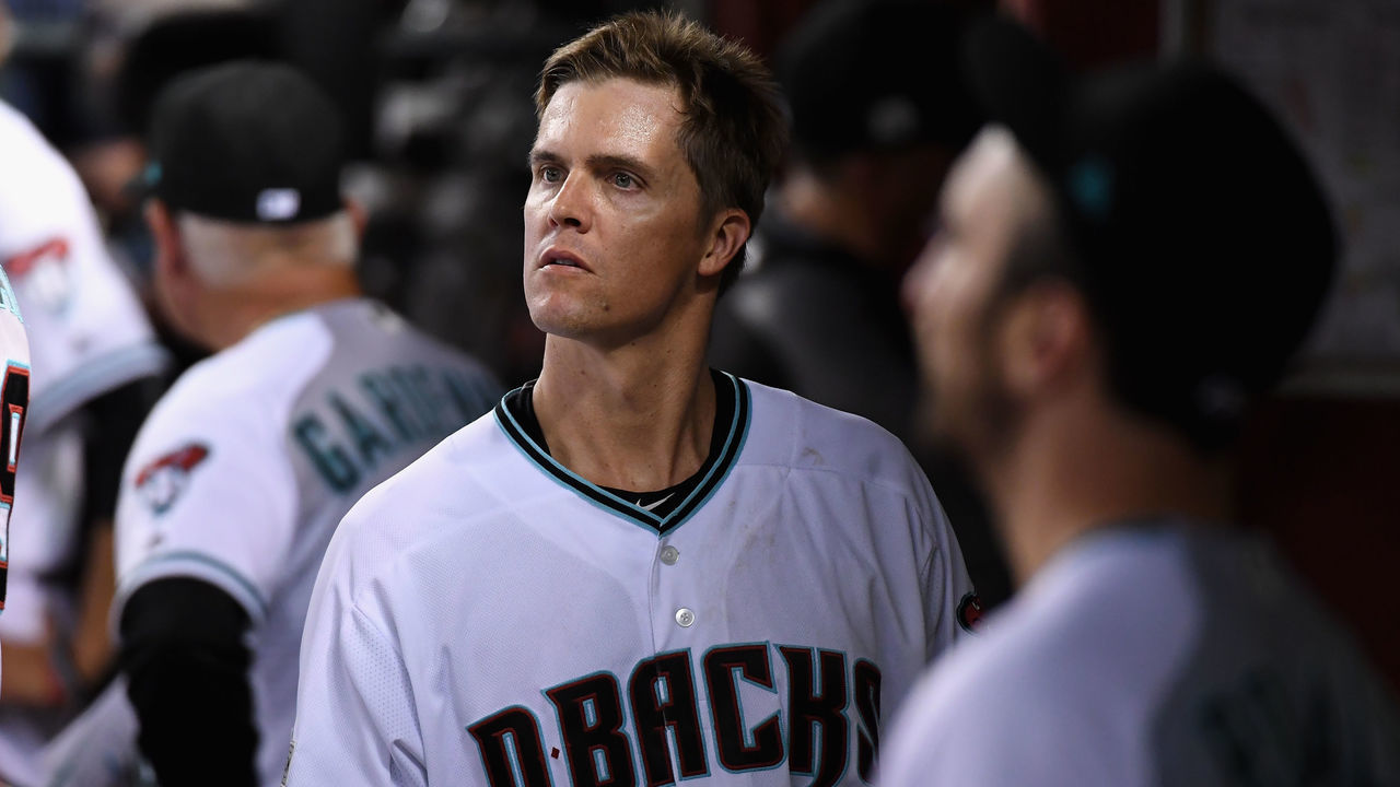 PHOENIX, AZ - OCTOBER 04: Zack Greinke #21 of the Arizona Diamondbacks watches the action after being removed from the game in the top of the fourth inning of the National League Wild Card game against the Colorado Rockies at Chase Field on October 4, 2017 in Phoenix, Arizona.