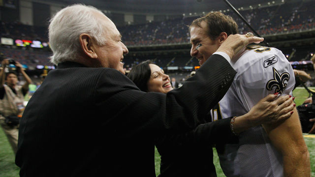 NEW ORLEANS, LA - SEPTEMBER 18: Drew Brees #9 of the New Orleans Saints celebrates with team owner Tom Benson after defeating the Chicago Bears 30-13 at Louisiana Superdome on September 18, 2011 in New Orleans, Louisiana.
