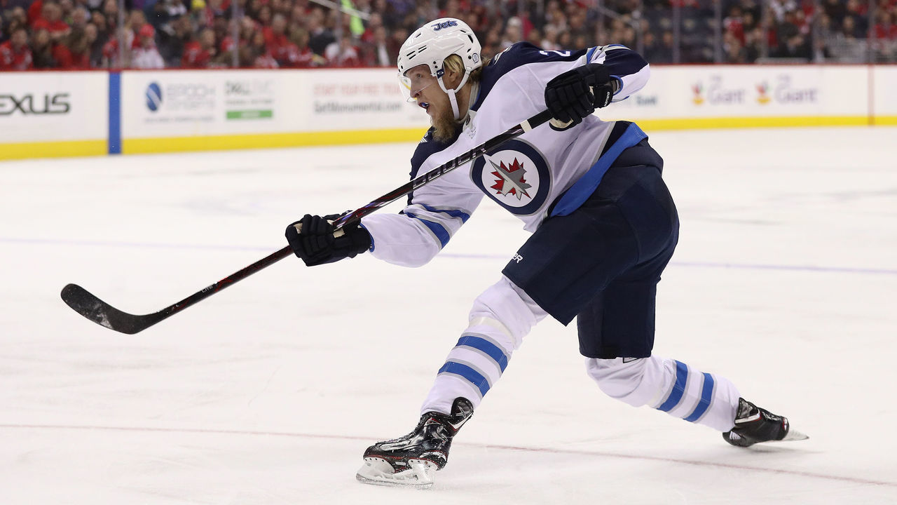 WASHINGTON, DC - MARCH 12: Patrik Laine #29 of the Winnipeg Jets shoots against the Washington Capitals during the first period at Capital One Arena on March 12, 2018 in Washington, DC.
