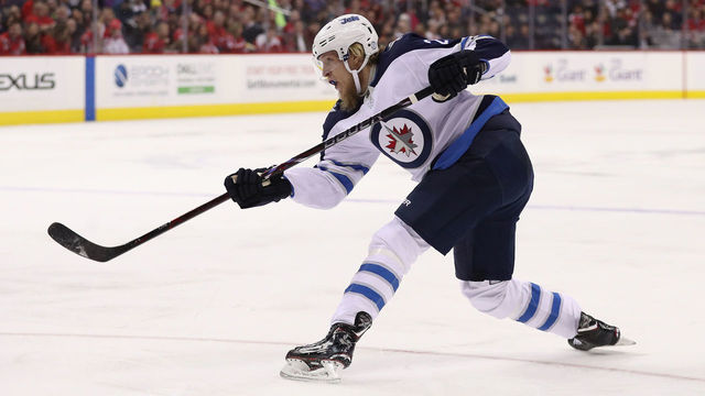 WASHINGTON, DC - MARCH 12: Patrik Laine #29 of the Winnipeg Jets shoots against the Washington Capitals during the first period at Capital One Arena on March 12, 2018 in Washington, DC.