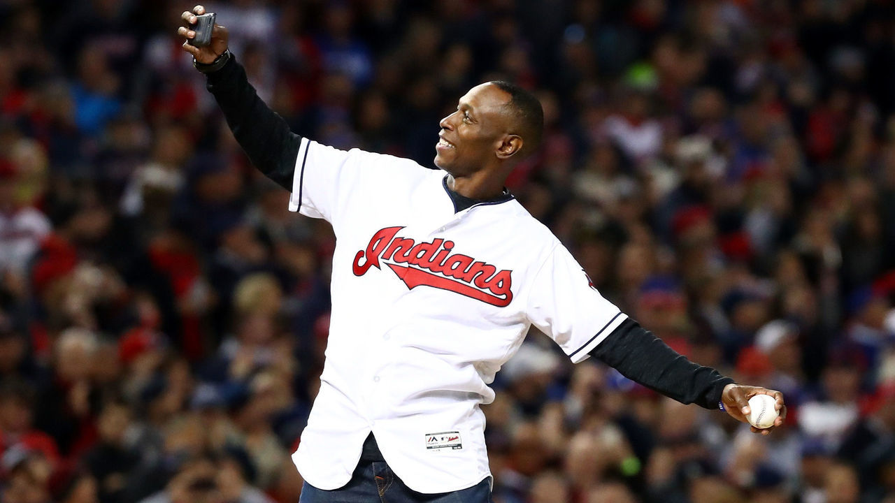 CLEVELAND, OH - OCTOBER 25: Former Cleveland Indians outfielder Kenny Lofton throws the first pitch prior to Game One of the 2016 World Series against the Chicago Cubs at Progressive Field on October 25, 2016 in Cleveland, Ohio.
