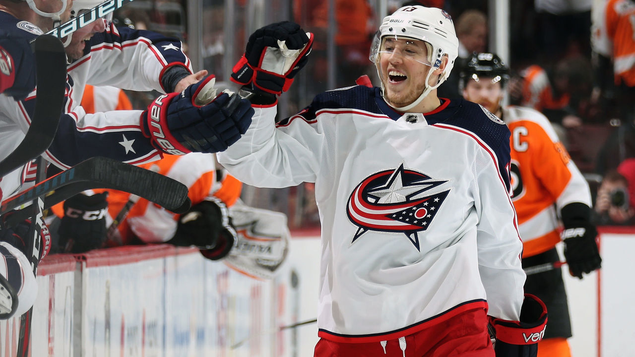 PHILADELPHIA, PA - MARCH 15: Cam Atkinson #13 of the Columbus Blue Jackets celebrates his third period empty-net goal against the Philadelphia Flyers with his teammates on the bench on March 15, 2018 at the Wells Fargo Center in Philadelphia, Pennsylvania. The goal was his third of the game. The Blue Jackets went on to defeat the Flyers 5-3.