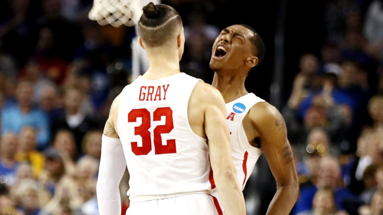 WICHITA, KS - MARCH 15: Rob Gray #32 is congratulated by his teammate Armoni Brooks #3 of the Houston Cougars after scoring the game-winning basket against the San Diego State Aztecs during the second half of the first round of the 2018 NCAA Men's Basketball Tournament at INTRUST Arena on March 15, 2018 in Wichita, Kansas. The Houston Cougars defeated the San Diego State Aztecs 67-65.