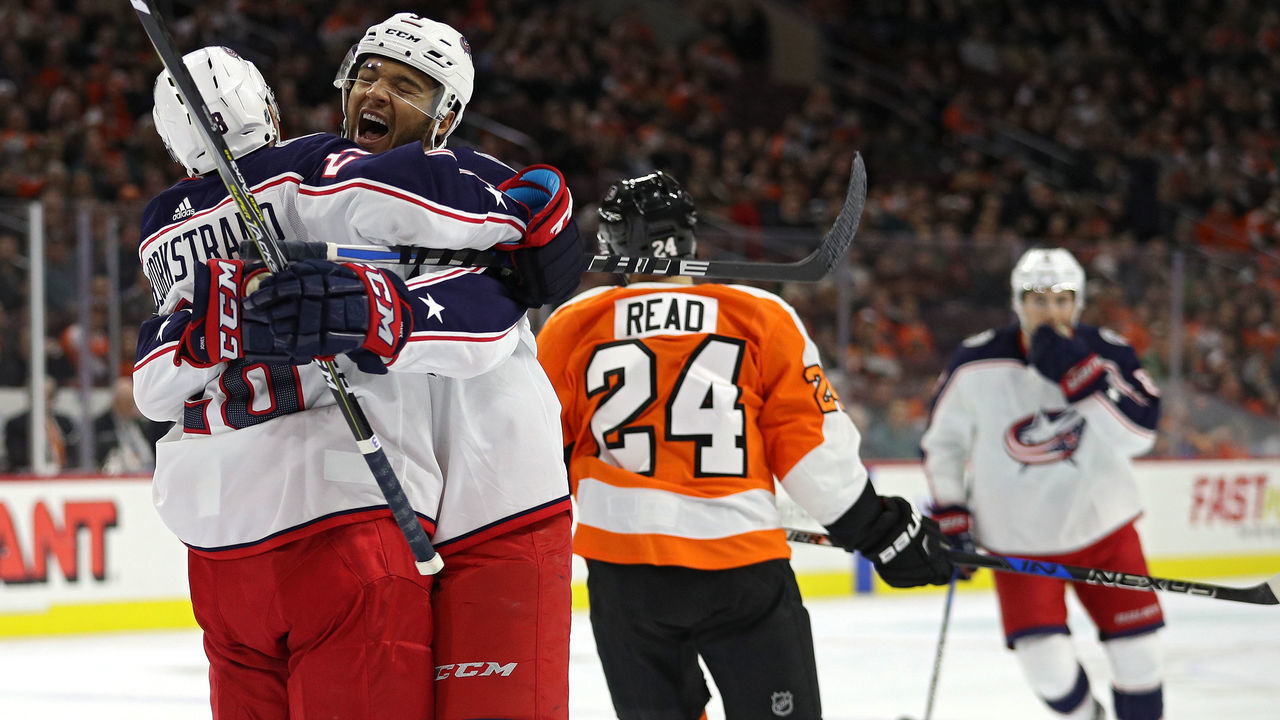 PHILADELPHIA, PA - MARCH 15: Oliver Bjorkstrand #28 of the Columbus Blue Jackets celebrates his goal with teammate Seth Jones #3 against the Philadelphia Flyers during the first period at Wells Fargo Center on March 15, 2018 in Philadelphia, Pennsylvania.