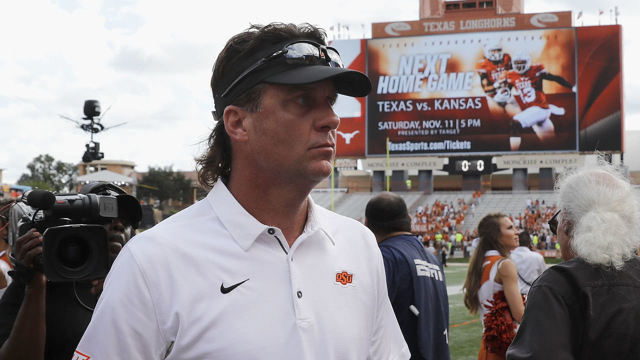 AUSTIN, TX - OCTOBER 21: Head coach Mike Gundy of the Oklahoma State Cowboys walks to the locker room after the game against the Texas Longhorns at Darrell K Royal-Texas Memorial Stadium on October 21, 2017 in Austin, Texas.