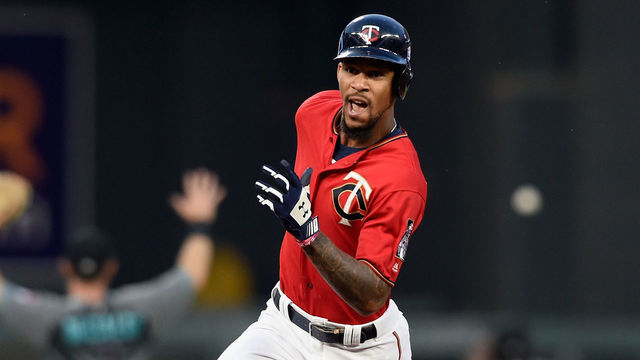 MINNEAPOLIS, MN - AUGUST 18: Byron Buxton #25 of the Minnesota Twins runs the bases after hitting a triple as Daniel Descalso #3 and Ketel Marte #4 of the Arizona Diamondbacks relay the ball back to the infield during the second inning of the game on August 18, 2017 at Target Field in Minneapolis, Minnesota.