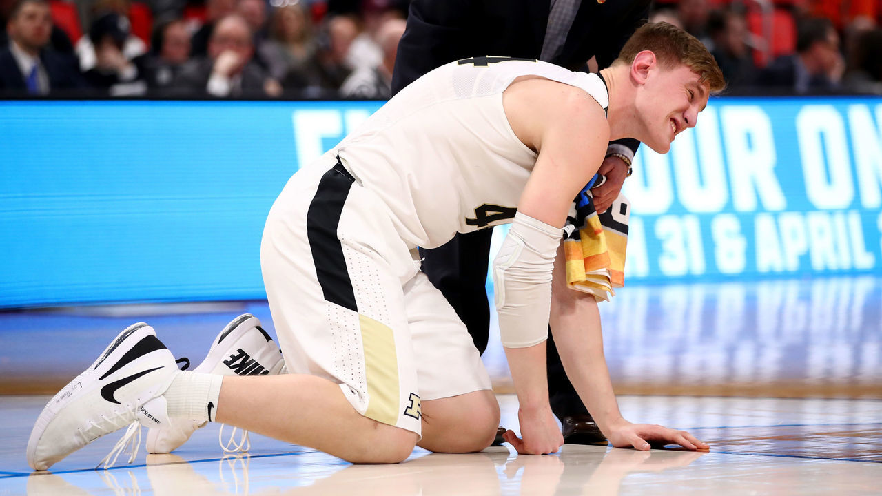 DETROIT, MI - MARCH 16: Isaac Haas #44 of the Purdue Boilermakers reacts after falling to the court on a foul by Cal State Fullerton Titans during the second half of the game in the first round of the 2018 NCAA Men's Basketball Tournament at Little Caesars Arena on March 16, 2018 in Detroit, Michigan.