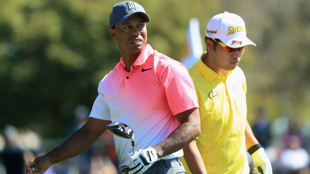 ORLANDO, FL - MARCH 16: Tiger Woods and Hideki Matsuyama of Japan walk from the tee during the second round at the Arnold Palmer Invitational Presented By MasterCard at Bay Hill Club and Lodge on March 16, 2018 in Orlando, Florida.