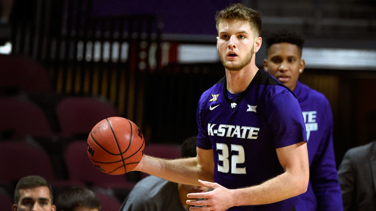 LAS VEGAS, NV - NOVEMBER 24: Dean Wade #32 of the Kansas State Wildcats looks on with the ball against the George Washington Colonials during the 2017 Continental Tire Las Vegas Invitational basketball tournament at the Orleans Arena on November 24, 2017 in Las Vegas, Nevada. Kansas State won 67-59.