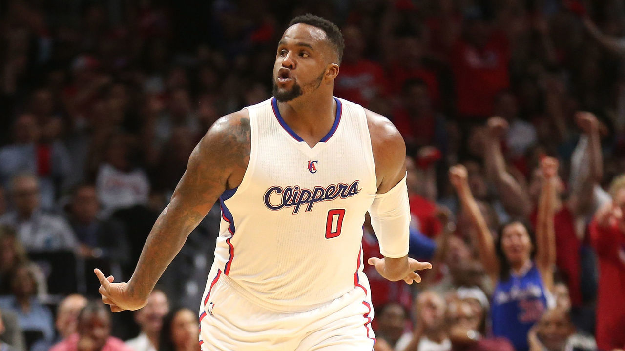 LOS ANGELES, CA - APRIL 28: Glen Davis #0 of the Los Angeles Clippers celebrates after making a basket against the San Antonio Spurs during Game Five of the Western Conference quarterfinals of the 2015 NBA Playoffs at Staples Center on April 28, 2015 in Los Angeles, California. The Spurs won 111-107.