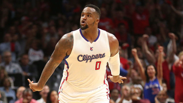 LOS ANGELES, CA - APRIL 28: Glen Davis #0 of the Los Angeles Clippers celebrates after making a basket against the San Antonio Spurs during Game Five of the Western Conference quarterfinals of the 2015 NBA Playoffs at Staples Center on April 28, 2015 in Los Angeles, California. The Spurs won 111-107.