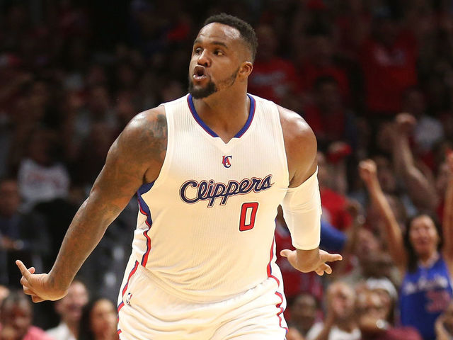 LOS ANGELES, CA - APRIL 28: Glen Davis #0 of the Los Angeles Clippers celebrates after making a basket against the San Antonio Spurs during Game Five of the Western Conference quarterfinals of the 2015 NBA Playoffs at Staples Center on April 28, 2015 in Los Angeles, California. The Spurs won 111-107.