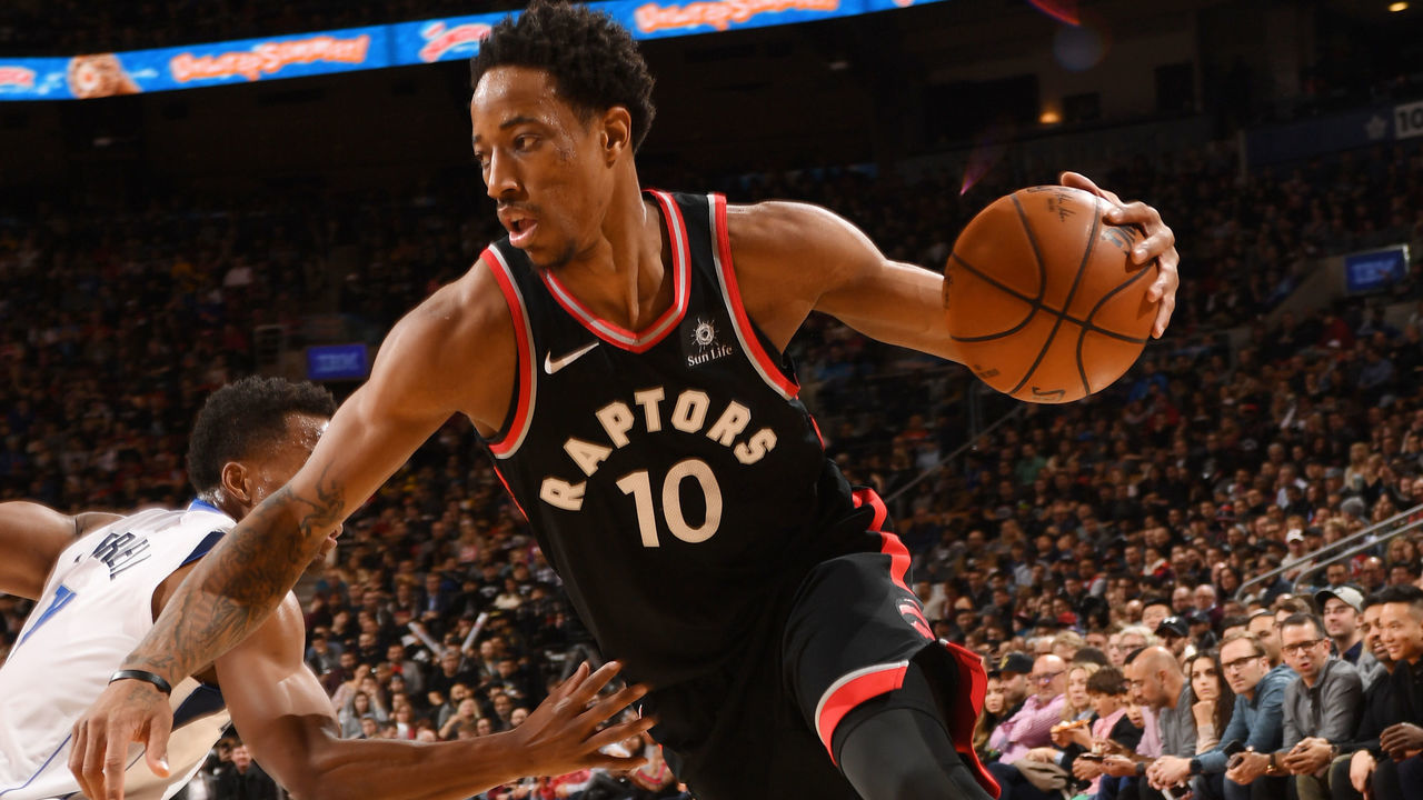 TORONTO, CANADA - MARCH 16: DeMar DeRozan #10 of the Toronto Raptors handles the ball against the Dallas Mavericks on March 16, 2018 at the Air Canada Centre in Toronto, Ontario, Canada. Mandatory Copyright Notice: Copyright 2018 NBAE