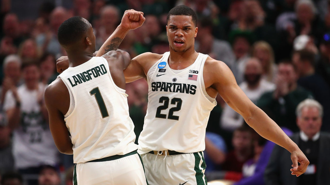 DETROIT, MI - MARCH 16: Miles Bridges #22 of the Michigan State Spartans celebrates with Joshua Langford #1 during the second half against the Bucknell Bison in the first round of the 2018 NCAA Men's Basketball Tournament at Little Caesars Arena on March 16, 2018 in Detroit, Michigan.