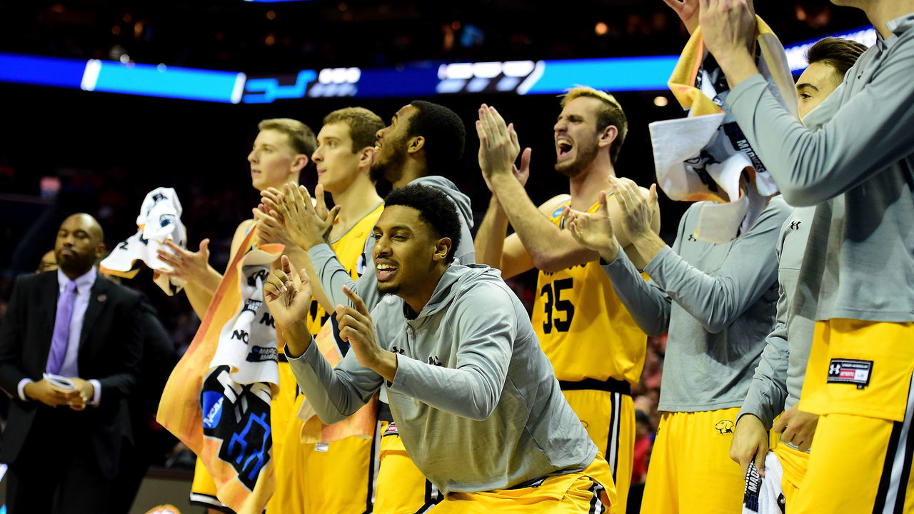 CHARLOTTE, NC - MARCH 16: The UMBC Retrievers bench reacts near the end of the first half against the Virginia Cavaliers during the first round of the 2018 NCAA Men's Basketball Tournament at Spectrum Center on March 16, 2018 in Charlotte, North Carolina.