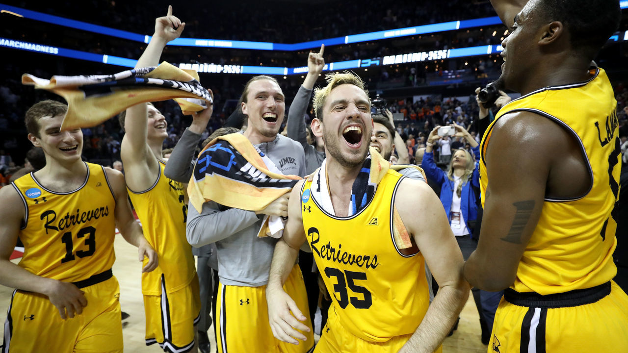 CHARLOTTE, NC - MARCH 16: The UMBC Retrievers bench reacts to their 74-54 victory over the Virginia Cavaliers during the first round of the 2018 NCAA Men's Basketball Tournament at Spectrum Center on March 16, 2018 in Charlotte, North Carolina.