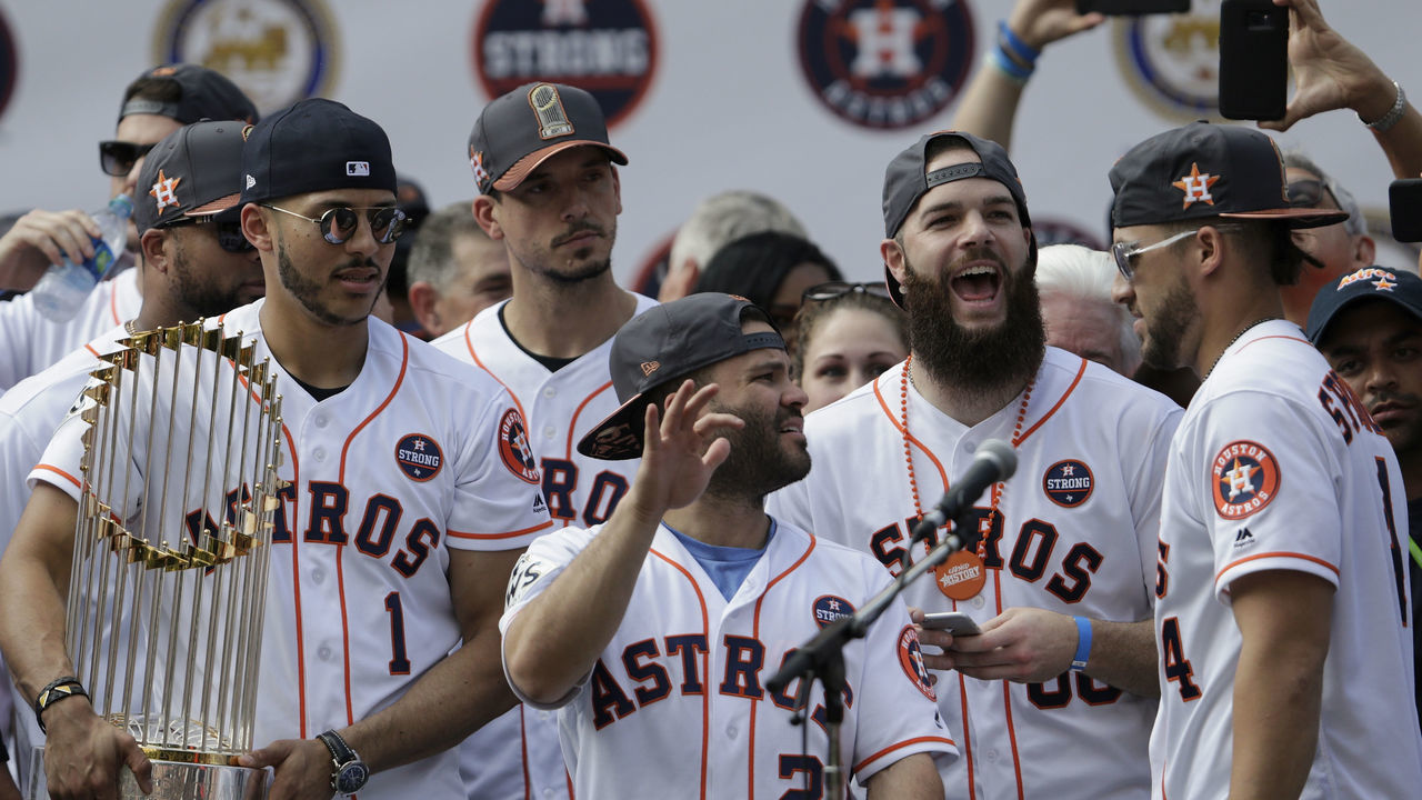 HOUSTON, TX - NOVEMBER 03: George Springer #4 of the Houston Astros is introduced during the Houston Astros Victory Parade on November 3, 2017 in Houston, Texas. The Astros defeated the Los Angeles Dodgers 5-1 in Game 7 to win the 2017 World Series.