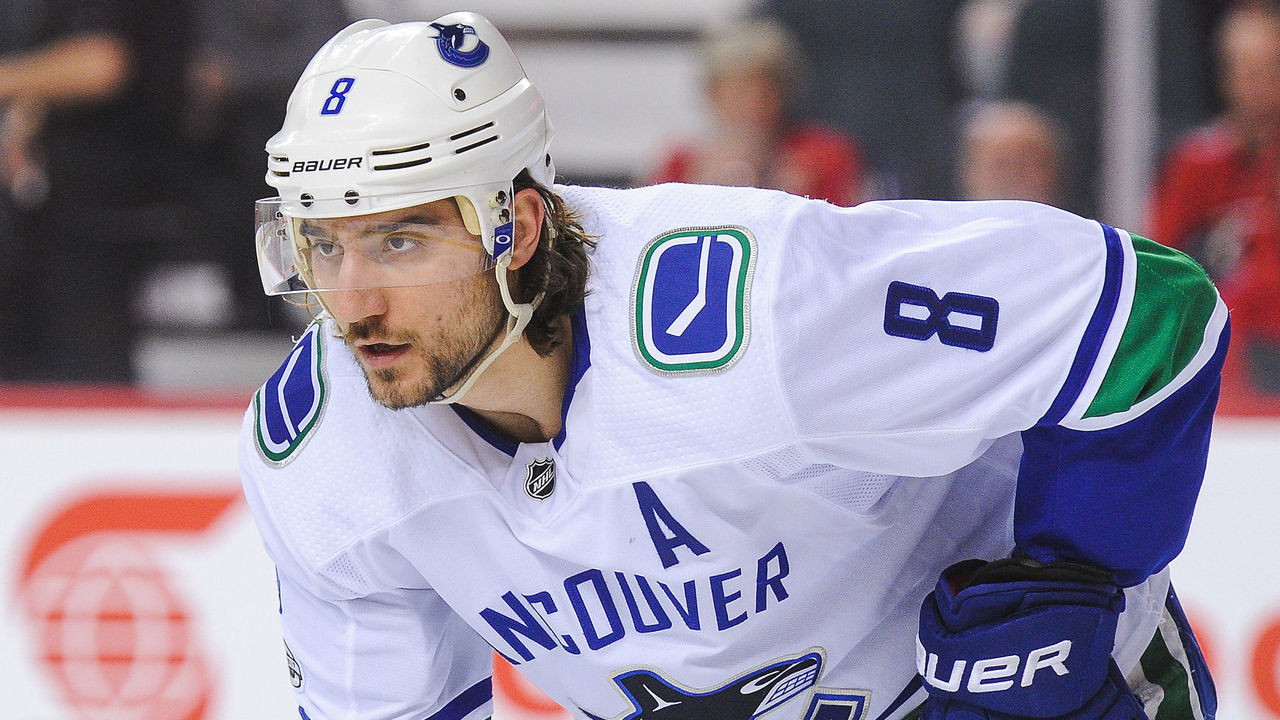 CALGARY, AB - DECEMBER 9: Chris Tanev #8 of the Vancouver Canucks in action against the Calgary Flames during an NHL game at Scotiabank Saddledome on December 9, 2017 in Calgary, Alberta, Canada.