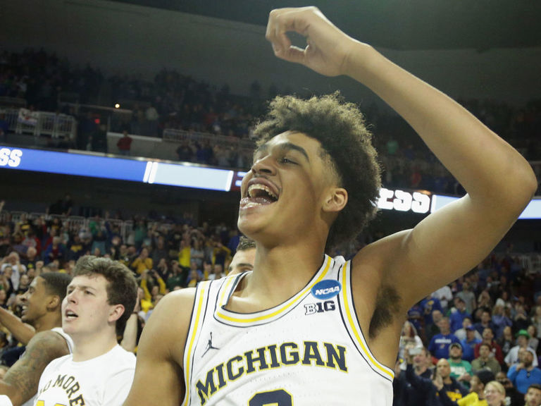 The 10 best photos from Jordan Poole's epic gamewinner