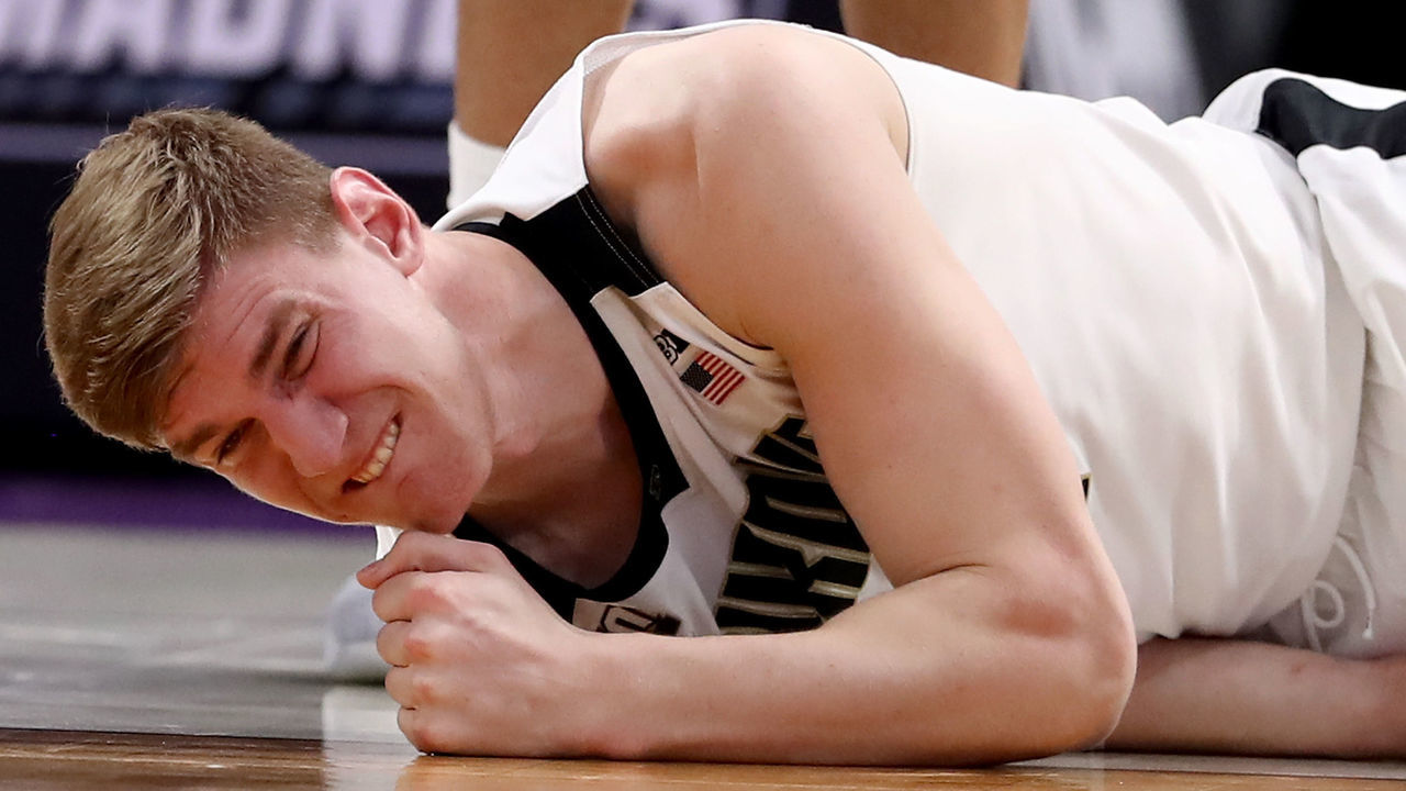 DETROIT, MI - MARCH 16: Isaac Haas #44 of the Purdue Boilermakers reacts after falling to the court on a foul by Cal State Fullerton Titans during the second half of the game in the first round of the 2018 NCAA Men's Basketball Tournament at Little Caesars Arena on March 16, 2018 in Detroit, Michigan.