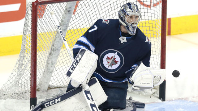 Jets' Hellebuyck describes Benn goal as one of best shots he's seen