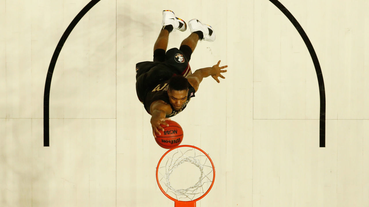 NASHVILLE, TN - MARCH 16: Trent Forrest #3 of the Florida State Seminoles dunks the ball against the Missouri Tigers during the game in the first round of the 2018 NCAA Men's Basketball Tournament at Bridgestone Arena on March 16, 2018 in Nashville, Tennessee.