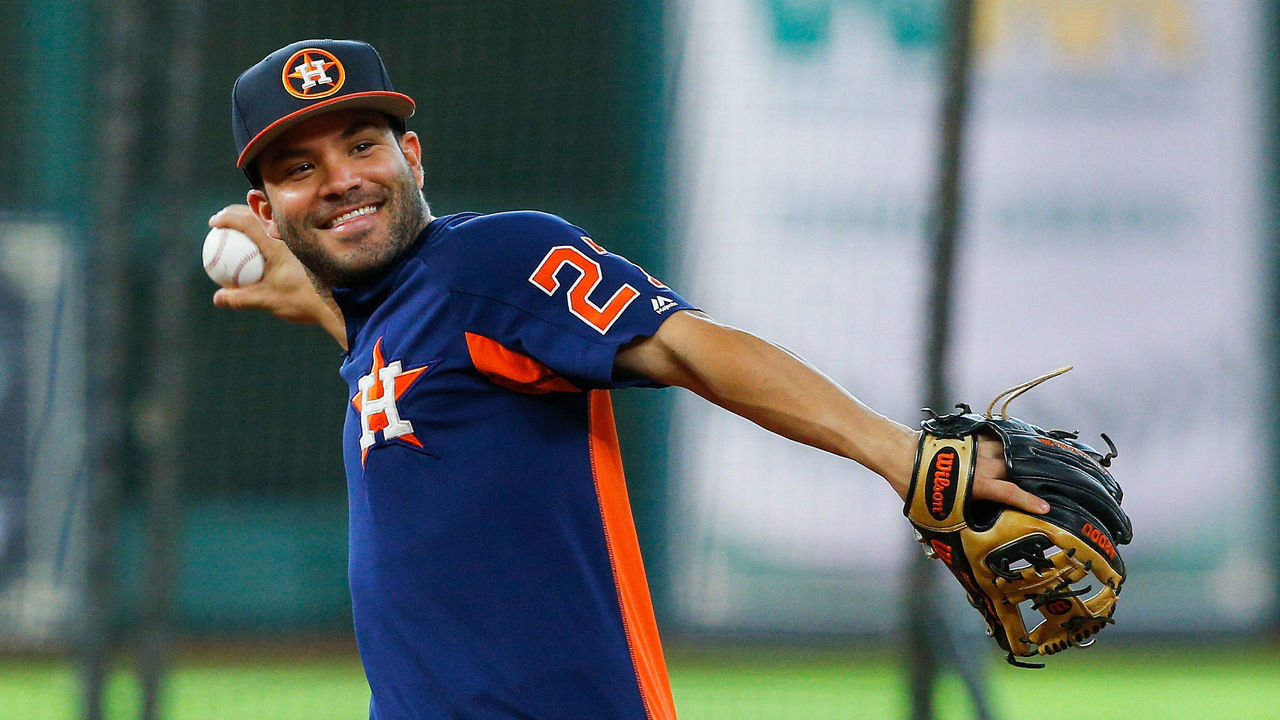 HOUSTON, TX - AUGUST 16: Jose Altuve #27 of the Houston Astros takes infield before playing the Arizona Diamondbacks at Minute Maid Park on August 16, 2017 in Houston, Texas.