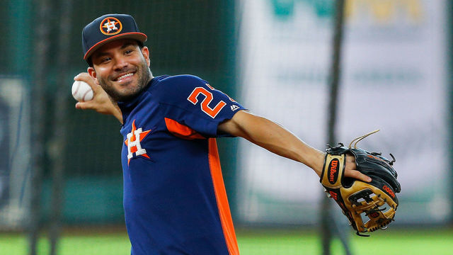 HOUSTON, TX - AUGUST 16: Jose Altuve #27 of the Houston Astros takes infield before playing the Arizona Diamondbacks at Minute Maid Park on August 16, 2017 in Houston, Texas.