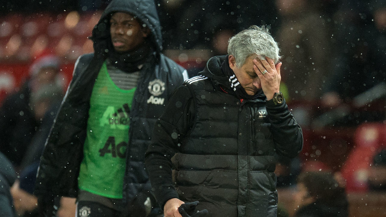 Manchester United's Portuguese manager Jose Mourinho (R) and French midfielder Paul Pogba leave after the English FA Cup quarter-final football match between Manchester United and Brighton and Hove Albion at Old Trafford in Manchester, north west England, on March 17, 2018. / AFP PHOTO / Oli SCARFF /