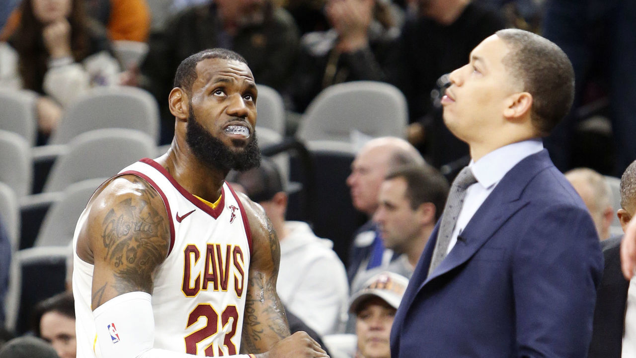 SAN ANTONIO,TX - JANUARY 23 : LeBron James #23 of the Cleveland Cavaliers waits with head coach Tyronn Lue during a time-out in the game against the San Antonio Spurs at AT&T Center on January 23, 2018 in San Antonio, Texas. NOTE TO USER: User expressly acknowledges and agrees that , by downloading and or using this photograph, User is consenting to the terms and conditions of the Getty Images License Agreement.