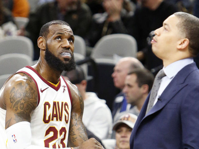 SAN ANTONIO,TX - JANUARY 23 : LeBron James #23 of the Cleveland Cavaliers waits with head coach Tyronn Lue during a time-out in the game against the San Antonio Spurs at AT&T Center on January 23, 2018 in San Antonio, Texas. NOTE TO USER: User expressly acknowledges and agrees that , by downloading and or using this photograph, User is consenting to the terms and conditions of the Getty Images License Agreement.