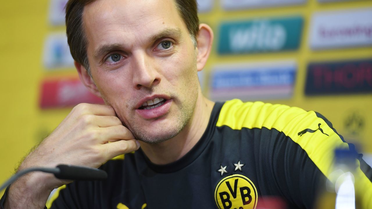 Dortmund's head coach Thomas Tuchel answers questions during a press conference in Brackel near Dortmund, western Germany, on April 21, 2017, on the eve of the German first division Bundesliga football match between Borussia Dortmund and Borussia Moenchengladbach. Police commandos arrested a German-Russian suspect behind a bomb attack on Borussia Dortmund's team bus, prosecutors said, indicating the motive was financial and not terror-related. They said the man, identified only as 28-year-old Sergej W., was hoping to profit from a drop in the football team's share price as a result of last week's attack. / AFP PHOTO / PATRIK STOLLARZ