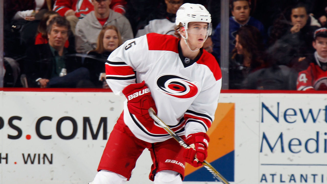 NEWARK, NJ - DECEMBER 29: Noah Hanifin #5 of the Carolina Hurricanes skates against the New Jersey Devils at the Prudential Center on December 29, 2015 in Newark, New Jersey. The Devils defeated the Hurricanes 3-2.