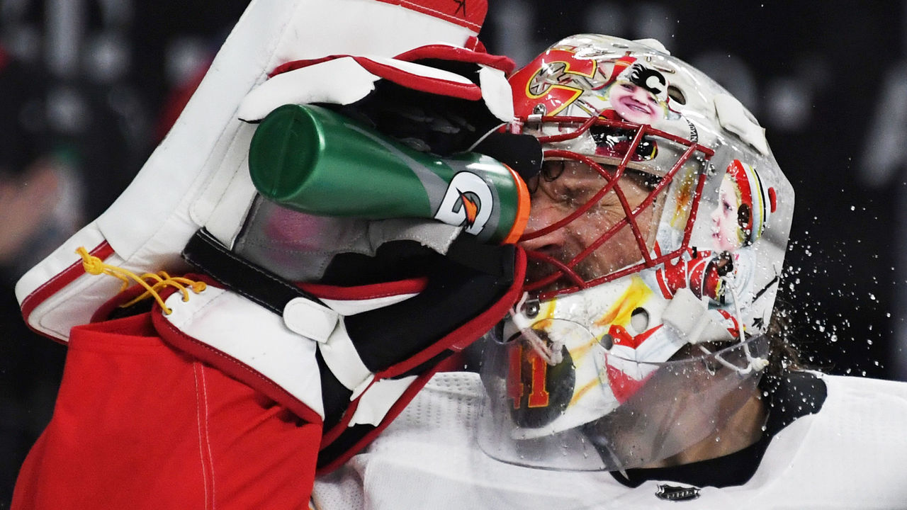 LAS VEGAS, NV - MARCH 18: Mike Smith #41 of the Calgary Flames takes a drink during a stop in play in the second period of a game against the Vegas Golden Knights at T-Mobile Arena on March 18, 2018 in Las Vegas, Nevada. The Golden Knights won 4-0.