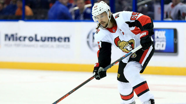 TAMPA, FL - MARCH 13: Erik Karlsson #65 of the Ottawa Senators passes during a game against the Tampa Bay Lightning at Amalie Arena on March 13, 2018 in Tampa, Florida.