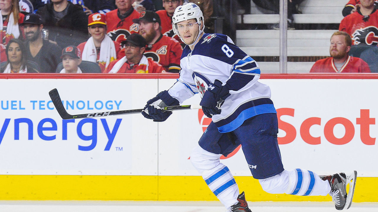 CALGARY, AB - OCTOBER 7: Jacob Trouba #8 of the Winnipeg Jets in action against the Calgary Flames during an NHL game at Scotiabank Saddledome on October 7, 2017 in Calgary, Alberta, Canada.