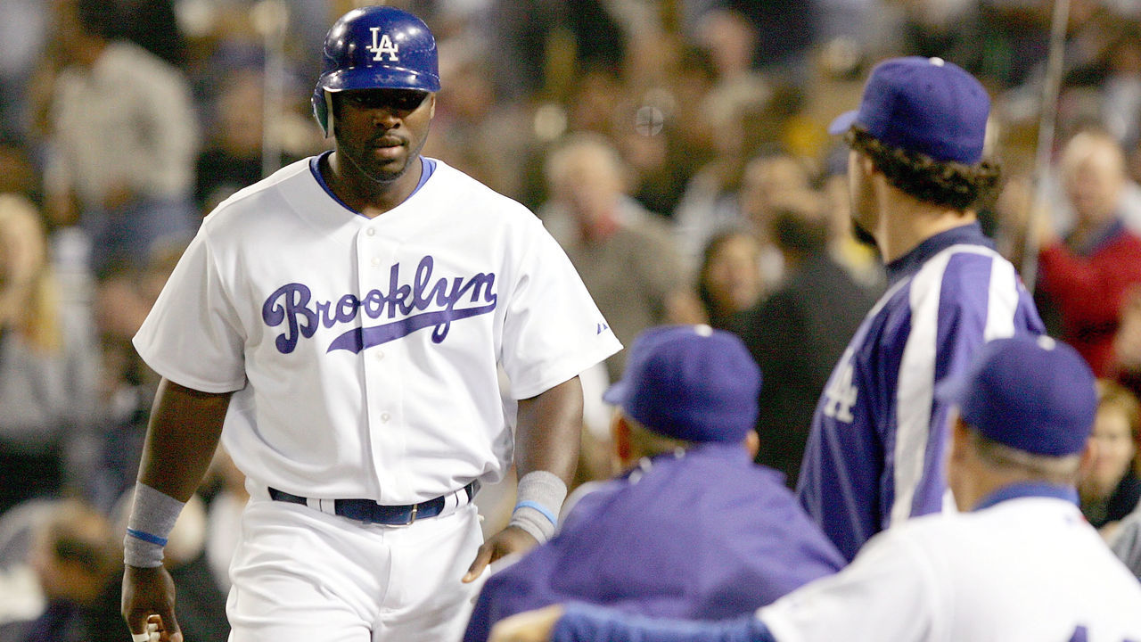 LOS ANGELES - APRIL 15: Milton Bradley #21 of the Los Angeles Dodgers walks back to the dugout after hitting a solo home run in the third inning against the San Diego Padres on April 15, 2005 at Dodger Stadium in Los Angeles, California. The Dodgers defeated the Padres 4-0.