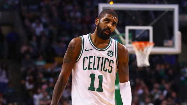BOSTON, MA - JANUARY 3: LeBron James #23 of the Cleveland Cavaliers and Kyrie Irving #11 of the Boston Celtics look on during the second half at TD Garden on January 3, 2018 in Boston, Massachusetts.