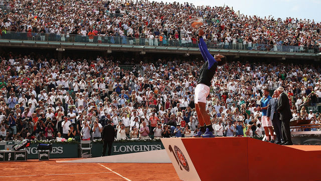 PARIS, FRANCE - JUNE 11: Rafael Nadal of Spain celebrates victory with the trophy after the men's singles final against Stan Wawrinka of Switzerland on day fifteen of the French Open at Roland Garros on June 11, 2017 in Paris, France.