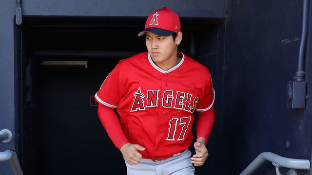 PEORIA, AZ - FEBRUARY 26: Shohei Ohtani #17 of the Los Angeles Angels walks in the dugout during the second inning of the spring training game against the San Diego Padres at Peoria Stadium on February 26, 2018 in Peoria, Arizona.