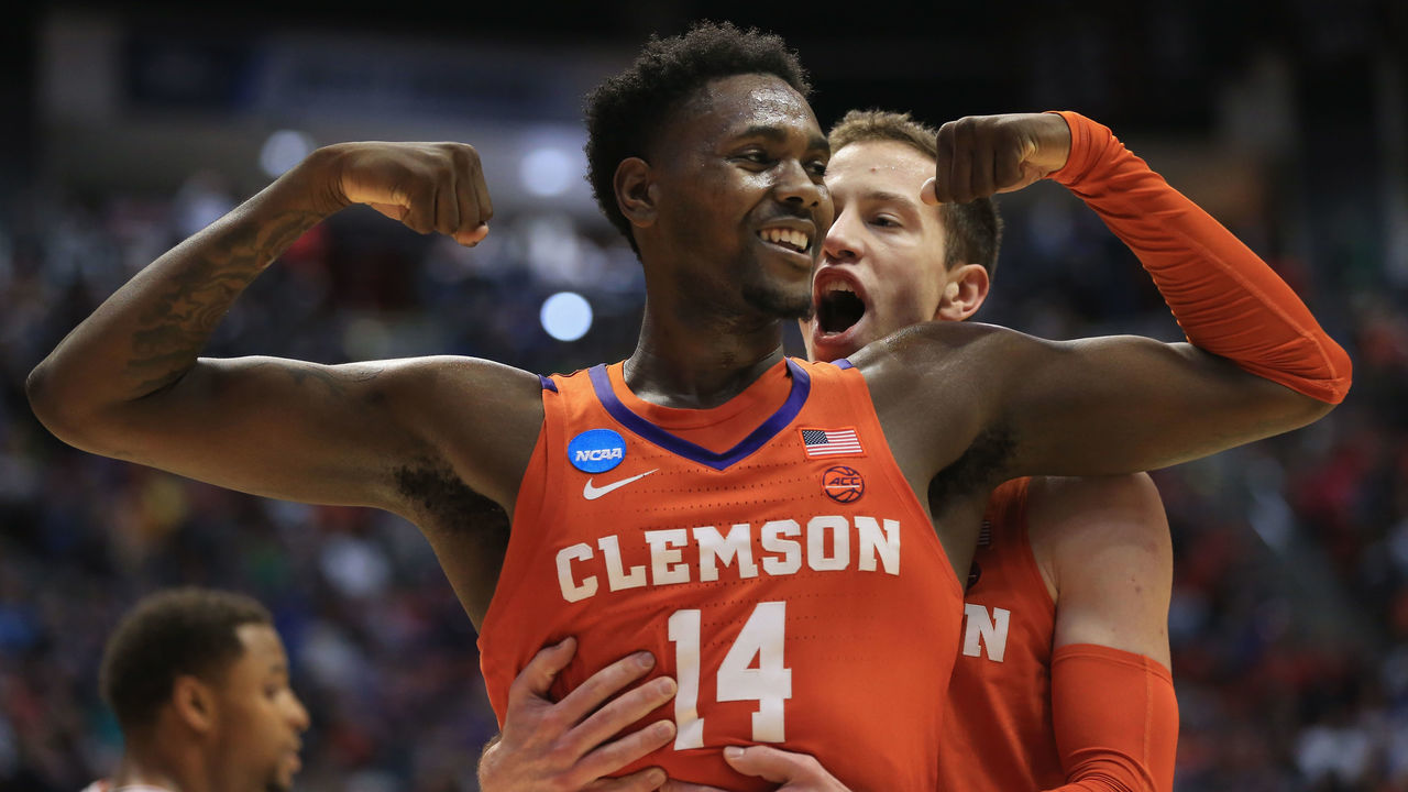 SAN DIEGO, CA - MARCH 18: Elijah Thomas #14 celebrates with David Skara #24 of the Clemson Tigers as they take on the Auburn Tigers in the first half during the second round of the 2018 NCAA Men's Basketball Tournament at Viejas Arena on March 18, 2018 in San Diego, California.