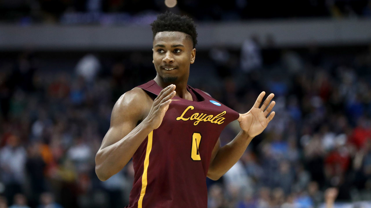DALLAS, TX - MARCH 15: Donte Ingram #0 of the Loyola Ramblers celebrates after Ingram's game-winning three pointer against the Miami Hurricanes in the first round of the 2018 NCAA Men's Basketball Tournament at American Airlines Center on March 15, 2018 in Dallas, Texas.