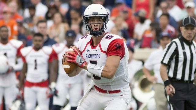 CHARLOTTESVILLE, VA - SEPTEMBER 03: Kyle Lauletta #5 of the Richmond Spiders looks for an open passer during a game at Scott Stadium on September 3, 2016 in Charlottesville, Virginia.